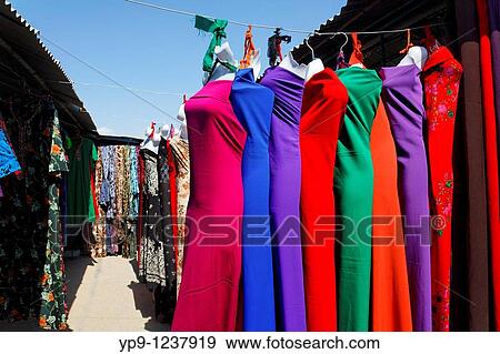 Turkmenistan - Ashgabat - Sunday Market - colourful displays in the Fabric Market View Large Photo Image Stock Photo - Turkmenistan - Ashgabat - Sunday Market - colourful displays in the Fabric Market. Fotosearch