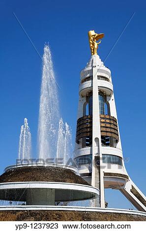 Stock Image - Turkmenistan - Ashgabat - the Arch of Neutrality. Fotosearch