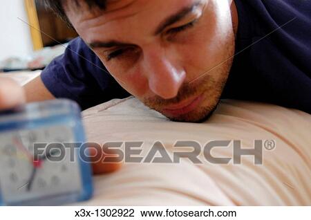 Turning off the alarm clock and waking up View Large Photo Image Stock Image - Turning off the alarm clock and waking up. Fotosearch