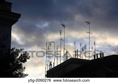 tv antenna on rooftops in rome italy View Large Photo Image Stock Photograph - tv antenna on rooftops in rome italy. Fotosearch