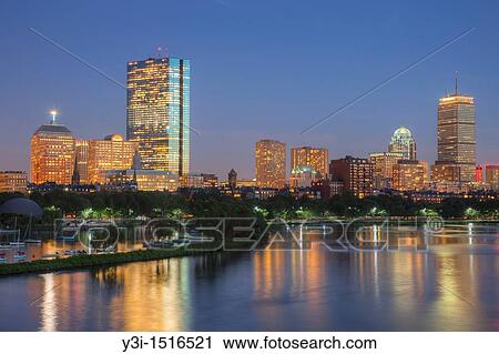 Twilight view of the Boston skyline including the John Hancock building and Prudential Center, as seen over the Charles River from the Longfellow Bridge, Boston, Massachusetts, USA. View Large Photo Image Stock Image - Twilight view of the Boston skyline including the John Hancock building and Prudential Center, as seen over the Charles River from the Longfellow Bridge, Boston, Massachusetts, USA.. Fotosearch
