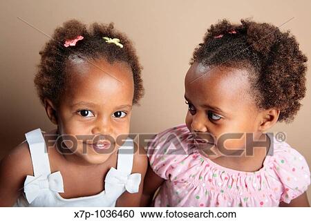 Twin African American Girls Stock Image X7p 1036460 Fotosearch