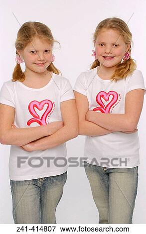 Twin sisters View Large Photo Image Stock Photo - Twin sisters. Fotosearch