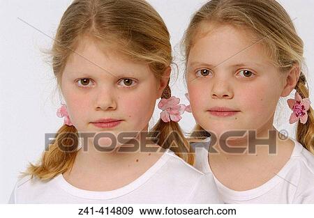 Twin sisters View Large Photo Image Stock Photo - Twin sisters. Fotosearch