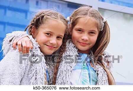 Stock Photograph - Twin Sisters.. Fotosearch