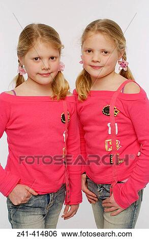 Twin sisters View Large Photo Image Stock Photograph - Twin sisters. Fotosearch