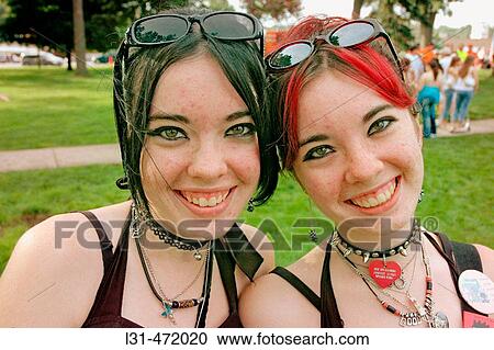 Twin Sisters who look alike and act alike as twins at the Twins gathering in Ohio Goth. USA. View Large Photo Image Stock Image - Twin Sisters who look alike and act alike as twins at the Twins gathering in Ohio Goth. USA.. Fotosearch