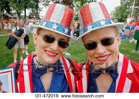 Twin Sisters who look alike and act alike as twins at the Twins gathering in Ohio. USA. View Large Photo Image Stock Photo - Twin Sisters who look alike and act alike as twins at the Twins gathering in Ohio. USA.. Fotosearch