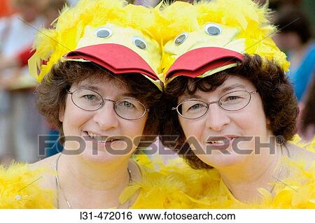 Twin Sisters who look alike and act alike as twins at the Twins gathering in Ohio. USA. View Large Photo Image Stock Photograph - Twin Sisters who look alike and act alike as twins at the Twins gathering in Ohio. USA.. Fotosearch
