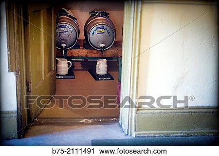 Two barrels of beer with jugs, Timothy Taylor's brand in a pub in Yorkshire Dales, England, UK, Europe. View Large Photo Image Stock Image - Two barrels of beer with jugs, Timothy Taylor's brand in a pub in Yorkshire Dales, England, UK, Europe.. Fotosearch