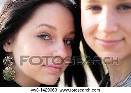 two beautiful brunette outdoor portrait View Large Photo Image Stock Image - two beautiful brunette outdoor portrait. Fotosearch
