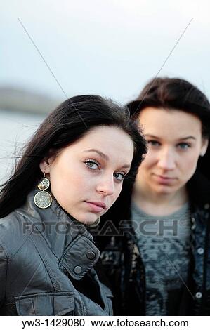 two beautiful brunette outdoor portrait near water sea, river or pond View Large Photo Image Stock Image - two beautiful brunette outdoor portrait near water sea, river or pond. Fotosearch