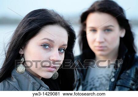 two beautiful brunette outdoor portrait near water sea, river or pond View Large Photo Image Stock Image - two beautiful brunette outdoor portrait near water sea, river or pond. Fotosearch