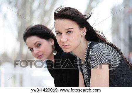 two beautiful brunette outdoor portrait View Large Photo Image Stock Photo - two beautiful brunette outdoor portrait. Fotosearch