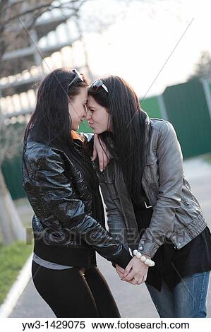 two beautiful brunette together outdoor portrait View Large Photo Image Stock Photography - two beautiful brunette together outdoor portrait. Fotosearch