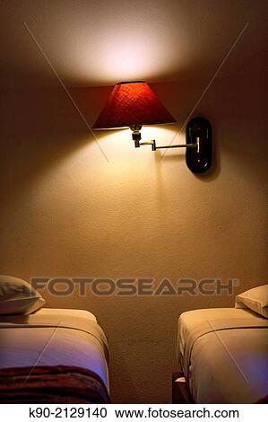 Two beds in a hotel room with a lamp, Chiang Mai, Thailand, Southeast Asia. View Large Photo Image Stock Image - Two beds in a hotel room with a lamp, Chiang Mai, Thailand, Southeast Asia.. Fotosearch