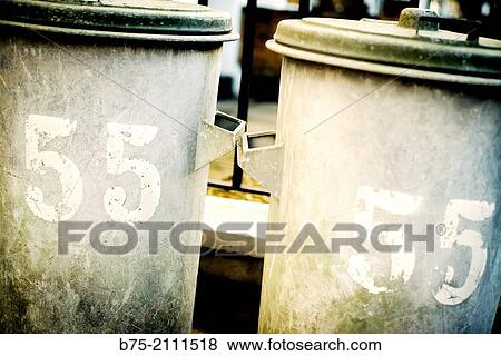 Two bins of a house with the number 55. London, England, UK, Europe. View Large Photo Image Stock Photo - Two bins of a house with the number 55. London, England, UK, Europe.. Fotosearch