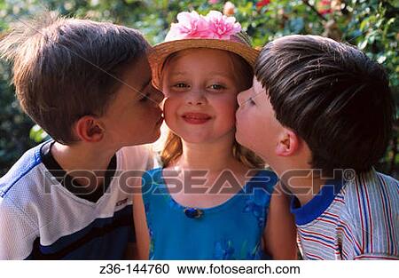 Two boys kissing a girl View Large Photo Image Stock Image - Two boys kissing a girl. Fotosearch