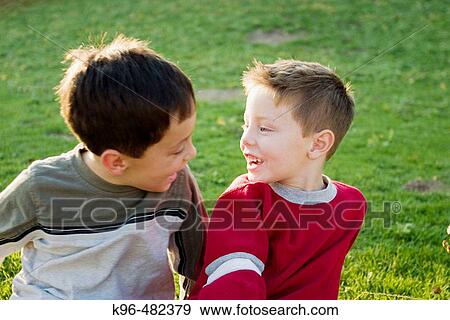 two boys laughing View Large Photo Image Stock Photo - two boys laughing. Fotosearch