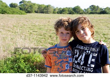 Stock Image - Two boys on a countryside trip. Fotosearch