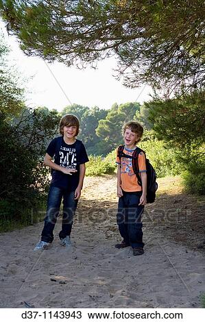 Two boys on a countryside trip View Large Photo Image Stock Image - Two boys on a countryside trip. Fotosearch