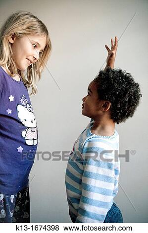Stock Photo - Two brothers playing. Fotosearch