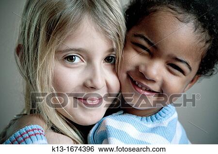 Stock Photograph - Two brothers playing. Fotosearch