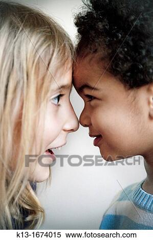 Two brothers playing View Large Photo Image Stock Photography - Two brothers playing. Fotosearch
