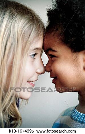 Two brothers playing View Large Photo Image Stock Photography - Two brothers playing. Fotosearch