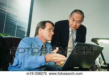 two businessman with laptop View Large Photo Image Stock Photography - two businessman with laptop. Fotosearch