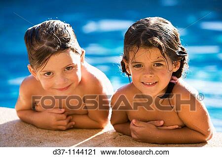 Two caucasian girls in the swimming pool View Large Photo Image Stock Image - Two caucasian girls in the swimming pool. Fotosearch