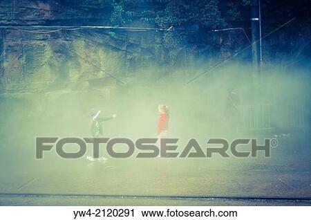 Two children enveloped in fog, Sydney, Australia View Large Photo Image Stock Image - Two children enveloped in fog, Sydney, Australia. Fotosearch