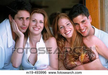 Stock Photograph - two couples together. Fotosearch