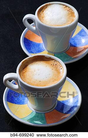 Two cups of coffee View Large Photo Image Stock Image - Two cups of coffee. Fotosearch