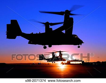 Two CV-22 Osprey aircraft, assigned to the 71st Special Operations Squadron, part of the 58th Special Operations Wing, take off en-route to a night training mission Tuesday here. View Large Photo Image Picture - Two CV-22 Osprey aircraft, assigned to the 71st Special Operations Squadron, part of the 58th Special Operations Wing, take off en-route to a night training mission Tuesday here.. Fotosearch