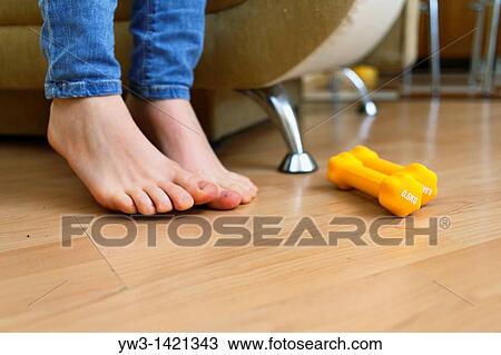 two dumbbels on a hard wood floor View Large Photo Image Stock Image - two dumbbels on a hard wood floor. Fotosearch