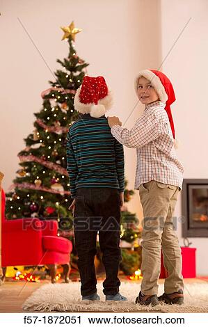 Two eight year old friends at Christmas time View Large Photo Image Stock Image - Two eight year old friends at Christmas time. Fotosearch