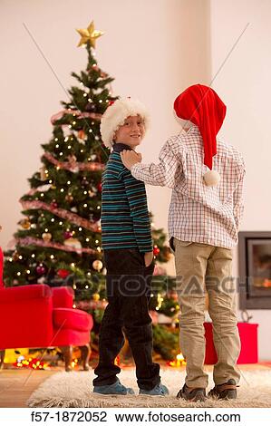 Two eight year old friends at Christmas time View Large Photo Image Stock Image - Two eight year old friends at Christmas time. Fotosearch