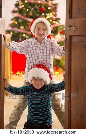 Two eight year old friends at Christmas time View Large Photo Image Stock Image - Two eight year old friends at Christmas time. Fotosearch