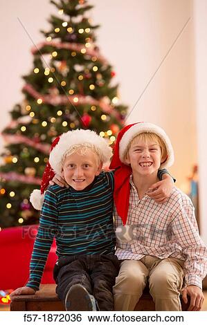 Two eight year old friends at Christmas time View Large Photo Image Stock Photograph - Two eight year old friends at Christmas time. Fotosearch