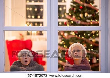 Two eight year old friends waiting for Santa Claus View Large Photo Image Stock Image - Two eight year old friends waiting for Santa Claus. Fotosearch