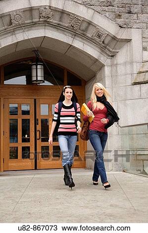 Two female college students walking out of a building, University of British Columbia, Vancouver, BC, Canada View Large Photo Image Stock Image - Two female college students walking out of a building, University of British Columbia, Vancouver, BC, Canada. Fotosearch