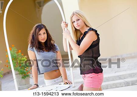 Two female girlfriends View Large Photo Image Stock Image - Two female girlfriends. Fotosearch