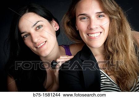 Two females, girls, womans, 30? s View Large Photo Image Picture - Two females, girls, womans, 30? s. Fotosearch