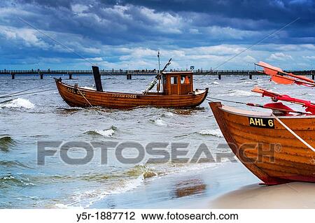 Two Fishing boats at the beach of the Baltic Sea, near the pier of the Baltic Sea resort of Ahlbeck, Municipality of Heringsdorf, Usedom Island, County Vorpommern-Greifswald, Mecklenburg-Western Pomerania, Germany, Europe, No Property Release available! View Large Photo Image Stock Image - Two Fishing boats at the beach of the Baltic Sea, near the pier of the Baltic Sea resort of Ahlbeck, Municipality of Heringsdorf, Usedom Island, County Vorpommern-Greifswald, Mecklenburg-Western Pomerania, Germany, Europe, No Property Release available!. Fotosearch