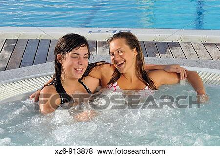 two friends in the Jacuzzi spa View Large Photo Image Stock Photo - two friends in the Jacuzzi spa. Fotosearch