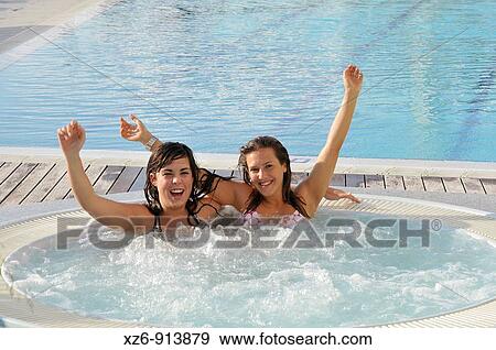 two friends in the Jacuzzi spa View Large Photo Image Stock Photo - two friends in the Jacuzzi spa. Fotosearch