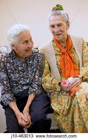 Two friends, woman age 90 on right has Alzheimer's disease, Boston. Massachusetts. USA. View Large Photo Image Stock Image - Two friends, woman age 90 on right has Alzheimer's disease, Boston. Massachusetts. USA.. Fotosearch
