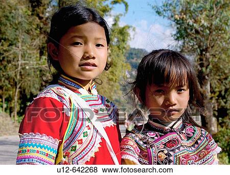 Stock Photo - two girl in the festival.. Fotosearch
