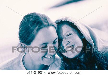 Two girlfriends View Large Photo Image Picture - Two girlfriends. Fotosearch